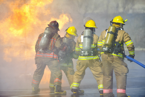 firefighters putting out fire