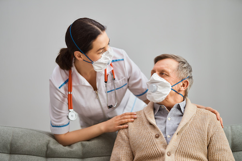 doctor and older male patient