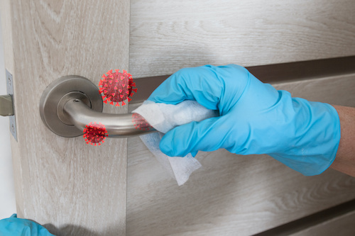 door handle being cleaned