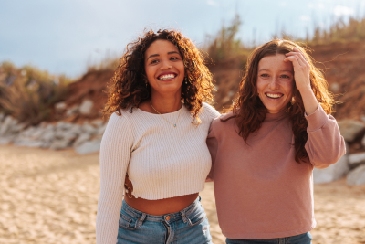 Young women friends on a beach