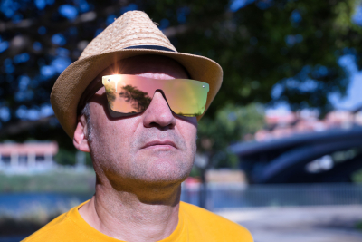 Hispanic Man with Sunglasses and Hat