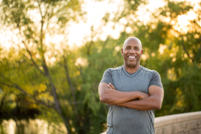 Man smiling in park