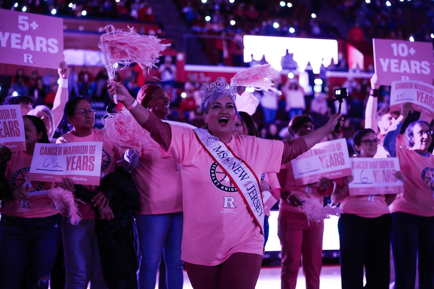 Play4Kay Cancer Warriors celebrating during halftime