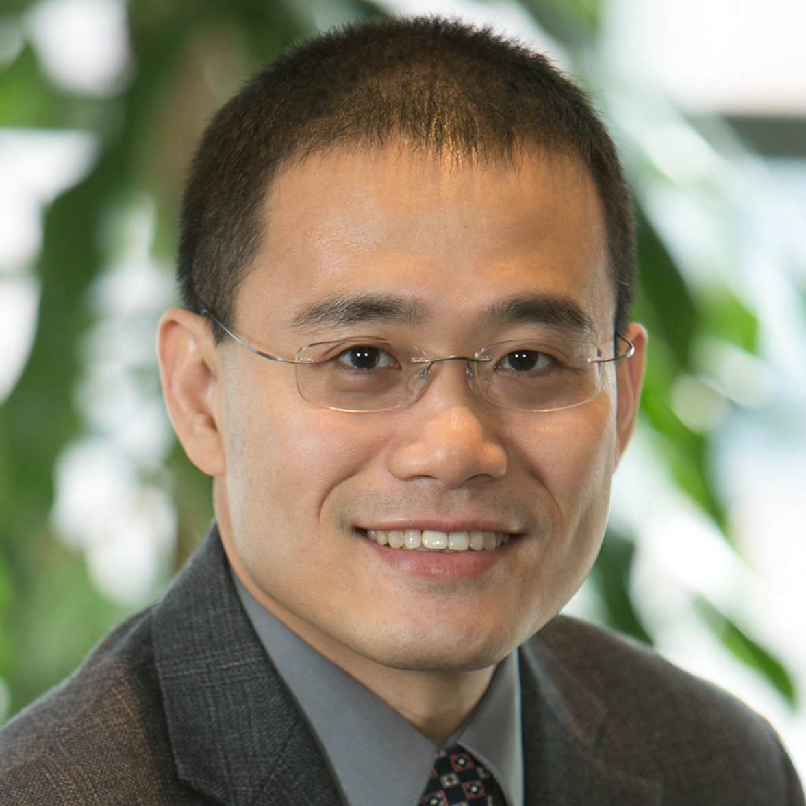 Headshot of Yibin Kang, PhD