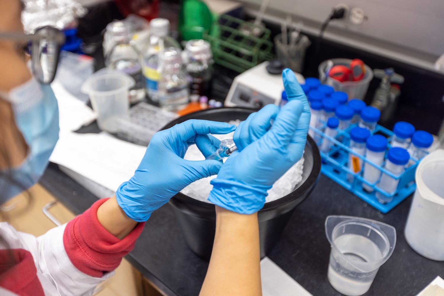 Researcher conducting work inside lab