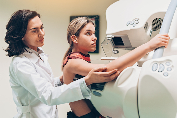 image of woman getting a mammogram