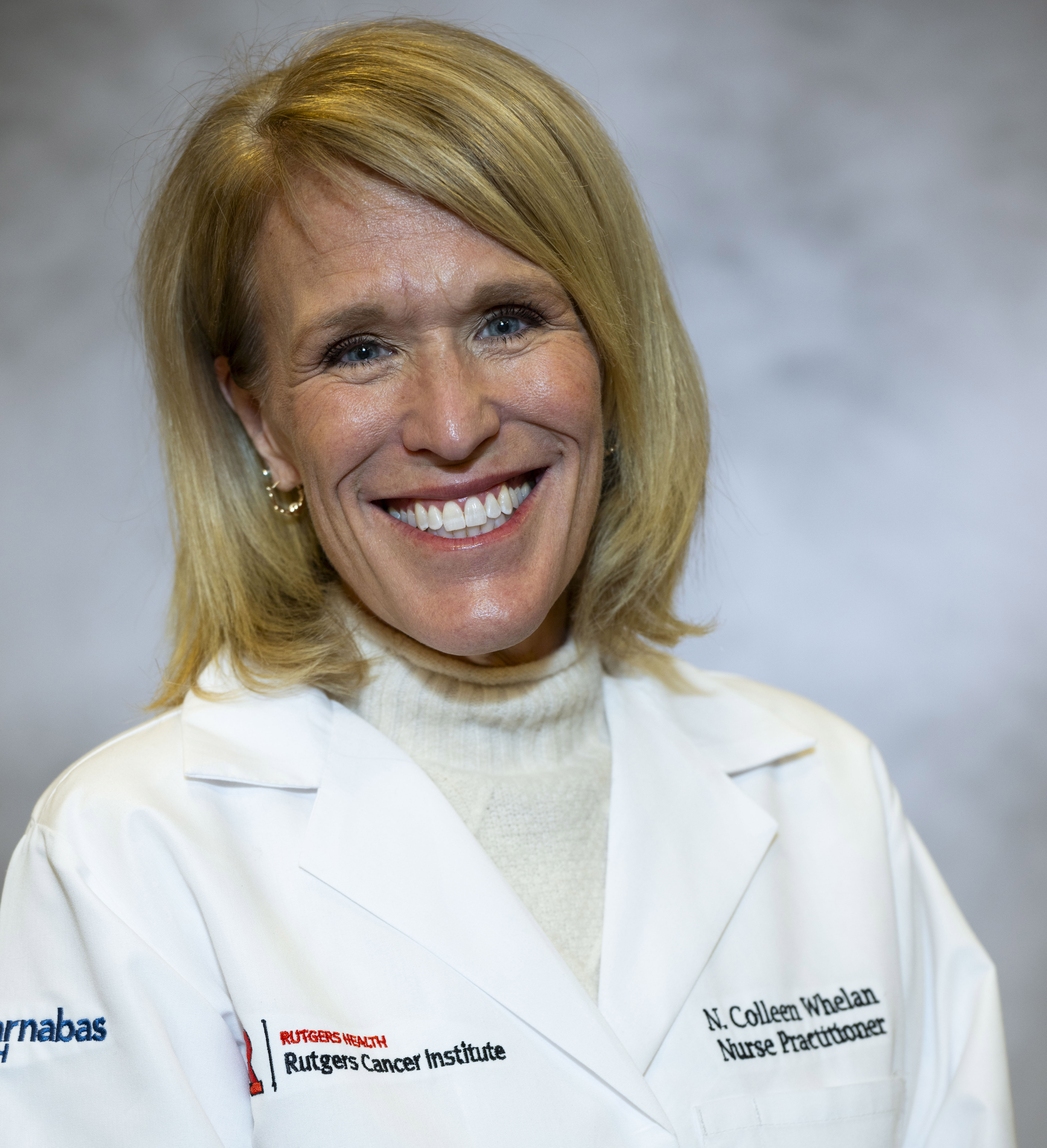 N. Colleen Whelan in clinic coat