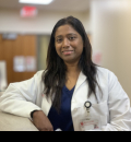 Photo of Annie Daniel in a lab coat